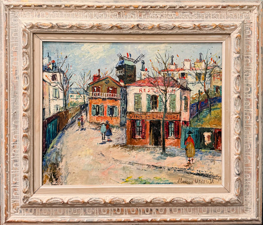 Painting of a street scene in Montmatre, Paris. A Sighting of Maoulin de Galette. People and buildings, framed in an ornate white frame.